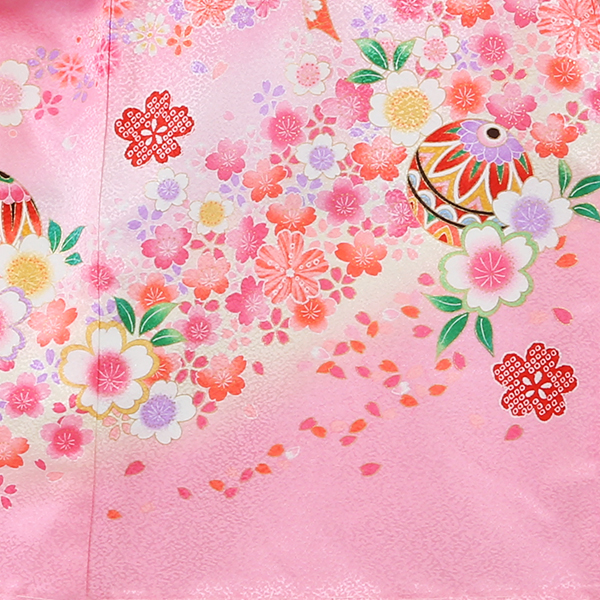 右に鞠、左に雪輪に鼓、背に鞠と桜流れ・ピンク